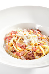 Macro Photo of Spaghetti Carbonara with Grated Parmesan and Bacon