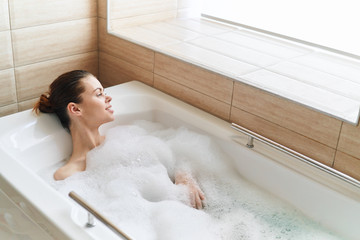 Naklejka premium woman taking a bath