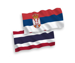 Flags of Thailand and Serbia on a white background