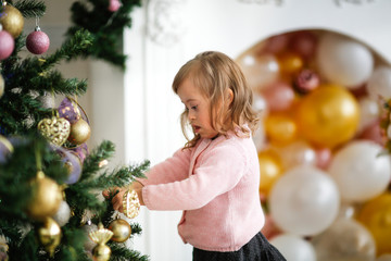 Caucasian blond child with Down syndrome,Christmas