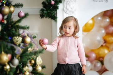 Caucasian blond child with Down syndrome,Christmas