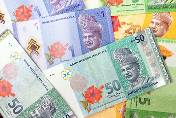 Various type of Malaysia Currency (MYR): Stack of Ringgit Malaysia bank note. (There are one, five, twenty and fifty)