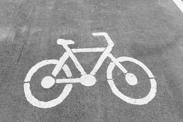 Naklejka na ściany i meble Empty cycle track with bike lane sign.