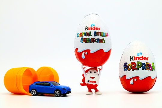 Italy &ndash; November 28, 2019: Kinder Surprise Chocolate Eggs with Kinderino Eggman Mascot. Kinder Surprise is a brand of products made in Italy by Ferrero