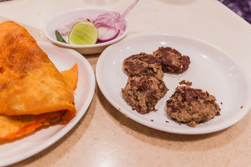 Mutton kebab with paratha, speciality of Lucknow, Uttar Pradesh state, India