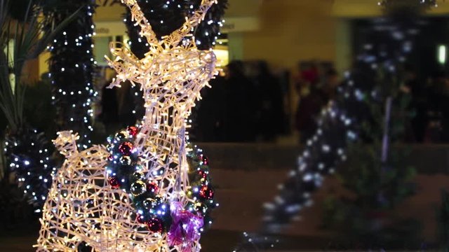 Christmas decorations and lights on the streets of the town of Salo on Lake Grada, Italy. Soft focus. Magic Nights.
