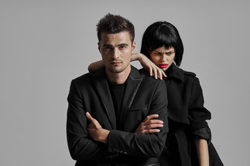 portrait of young man and woman