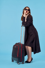 young woman with suitcase