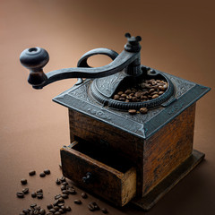 Grinding Roasted Coffee Beans with Hand Grinder