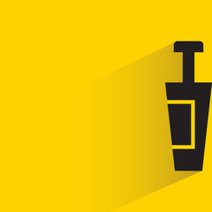beverage bottle with drop shadow yellow background