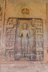 Buddha image carved into a cliff in Ajanta, Maharasthra state, India