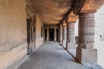 AJANTA, INDIA - FEBRUARY 6, 2017: Monastery (vihara) carved into a cliff in Ajanta, Maharasthra state, India