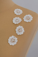 Texture flowers lace fabric. decor flowers on dummy, mannequin