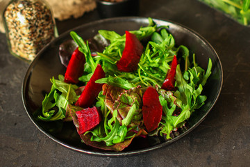 salad beetroot, leaf mix (beet, lettuce, arugula, red chard and more) menu concept. food background. top view. copy space