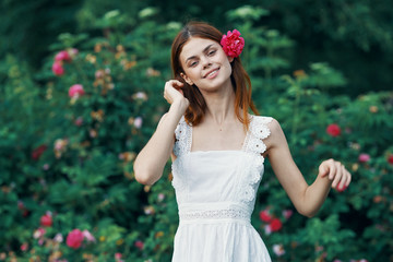 girl in red dress with apple in garden