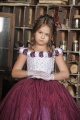 Vintage portrait of little girl in purple dress