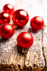 Christmas ball on snow flakes. Selective focus. Shallow depth of field.