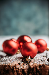 Christmas ball on snow flakes. Selective focus. Shallow depth of field.