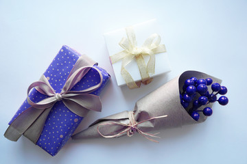 Present gift boxes with bow on white background.