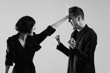 silhouette of man with bottle of wine