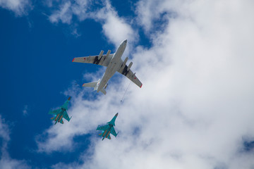 Fototapeta na wymiar airplane in the sky, IL-78 and CU-34