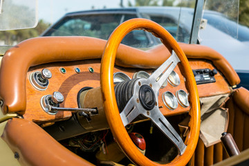 steering wheel of a vintage car