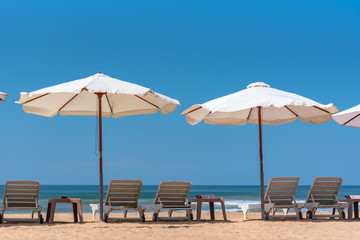 Indian ocean with golden sand, Bentota, Sri Lanka. A wonderful nature landscape of a beach scene.