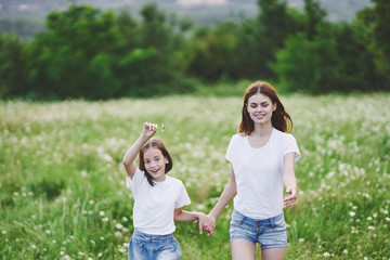 Fototapeta premium mother and daughter in the park