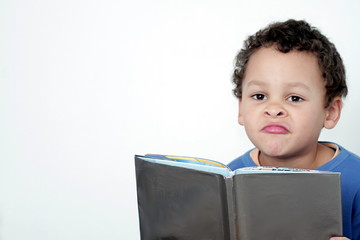 boy with school book going back to school on white background stock photo