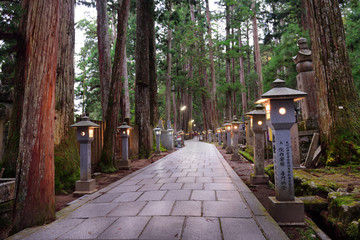 Koyasan, Japan - November 20, 2019: Walkway to Kobodaishi Gobyo Mausoleum at Okunoin Cemetery Park in Mount Koya, Japan. Mount Koya is UNESCO World Heritage Site- Sacred Sites