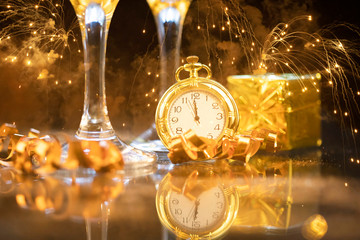 New Year's at midnight - Old clock with holiday lights