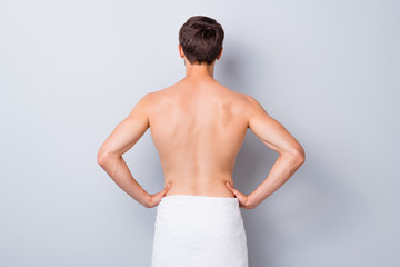 Back rear side view photo of handsome guy stand after man spa salon skincare therapy treatment have...