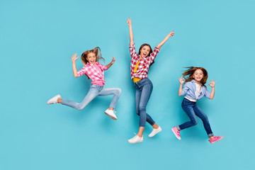 Full length body size photo of white cheerful nice family enjoying their lives wearing jeans denim casually while isolated with blue background