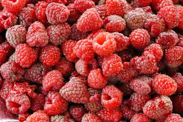 Fresh raspberries at a farmers market