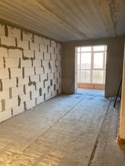 empty room without repair with a window