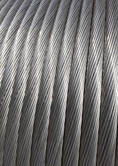 Aluminum electrical power cable background. Closeup image of heavy aluminum wire