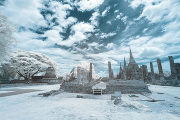 Ruined ancient Buddhist temple and pagoda in infrared photography