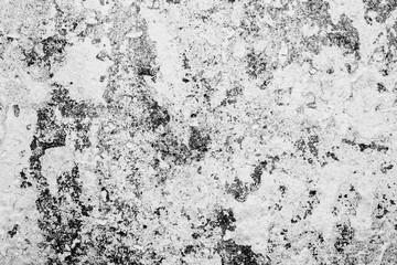 Texture of a concrete wall with cracks and scratches which can be used as a background