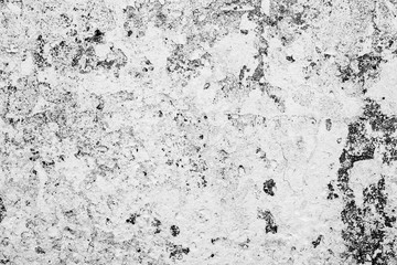 Texture of a concrete wall with cracks and scratches which can be used as a background