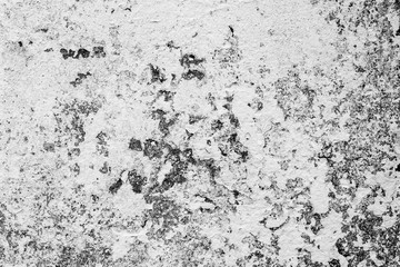 Texture of a concrete wall with cracks and scratches which can be used as a background