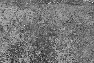 Texture of a concrete wall with cracks and scratches which can be used as a background