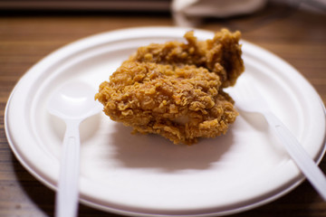  Fried chicken on a white plate, ready to eat fast food