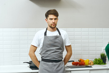 man in kitchen