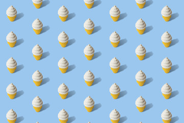 White ice cream in cone texture pattern abstract isolated on blue.