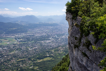 Fototapeta na wymiar Aerial view of the city of Grenoble from the top of a cliff