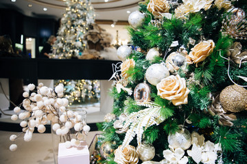 Beautiful Christmas tree decorated with balls and other toys.