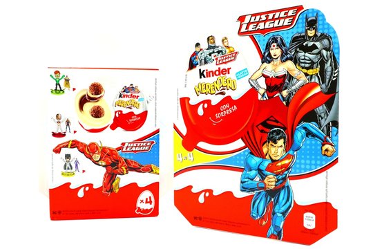 Italy – March 23, 2019: Kinder JOY Merendero JUSTICE LEAGUE Chocolate Eggs. Kinder  is a brand of products made in Italy by Ferrero, Justice League is a Trademark of DC Comics WB SHIELD WBEI