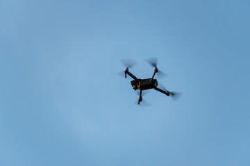 drone flying taking videos of unsuspecting people