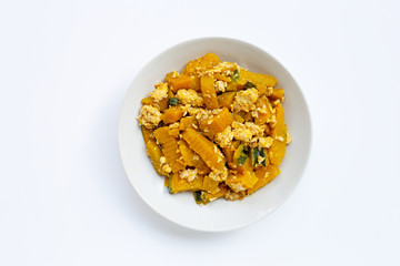 Stir-fried pumpkin with eggs on white