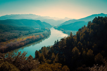 View of the Ebro river from the Miravet castle viewpoint, Tarragona  Ebro river meanders on a mild...